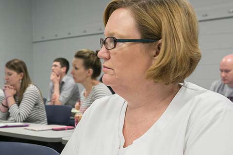 nursing student listening in class cta