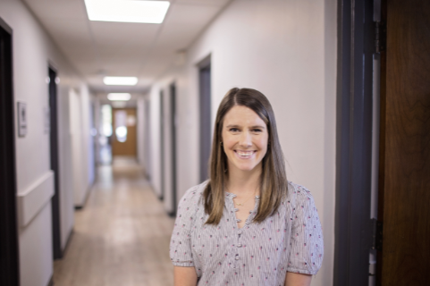 smiling woman in hallway DR09222022536