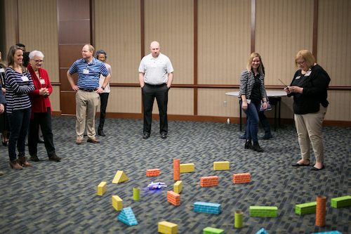 Faculty and staff in flight simulation