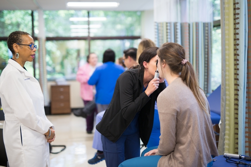 Nursing students practicing.