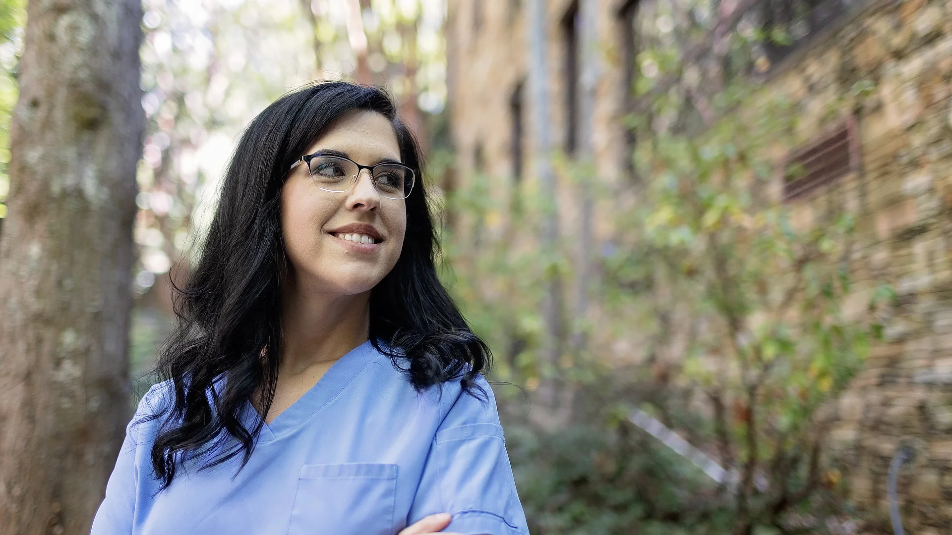Female Nurse Standing Outside
