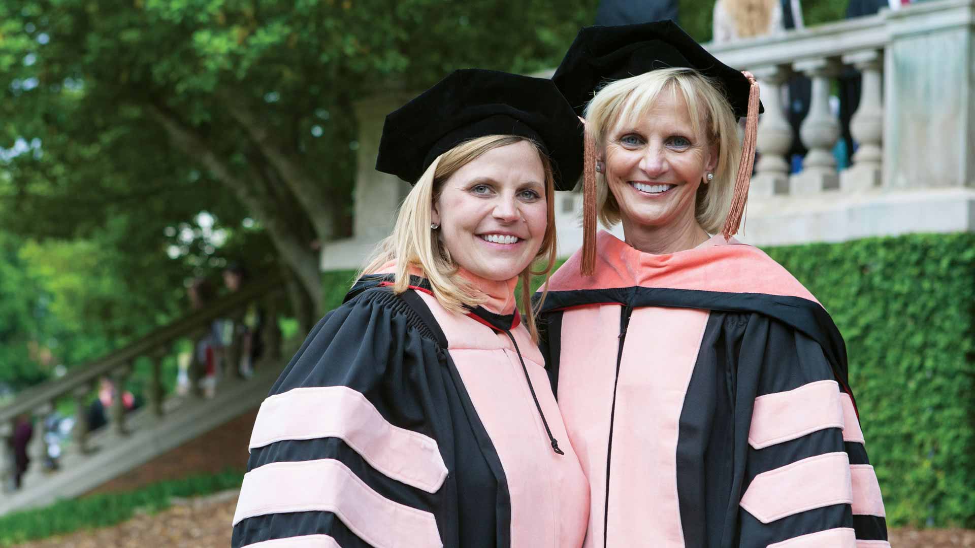 two female DNP graduates