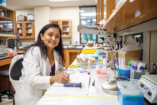 Female pharmacy student researching