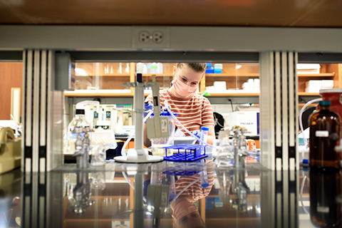 female student in lab