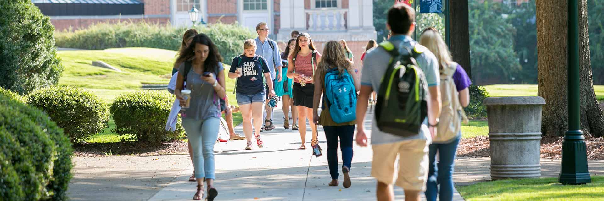 students walking on campus header