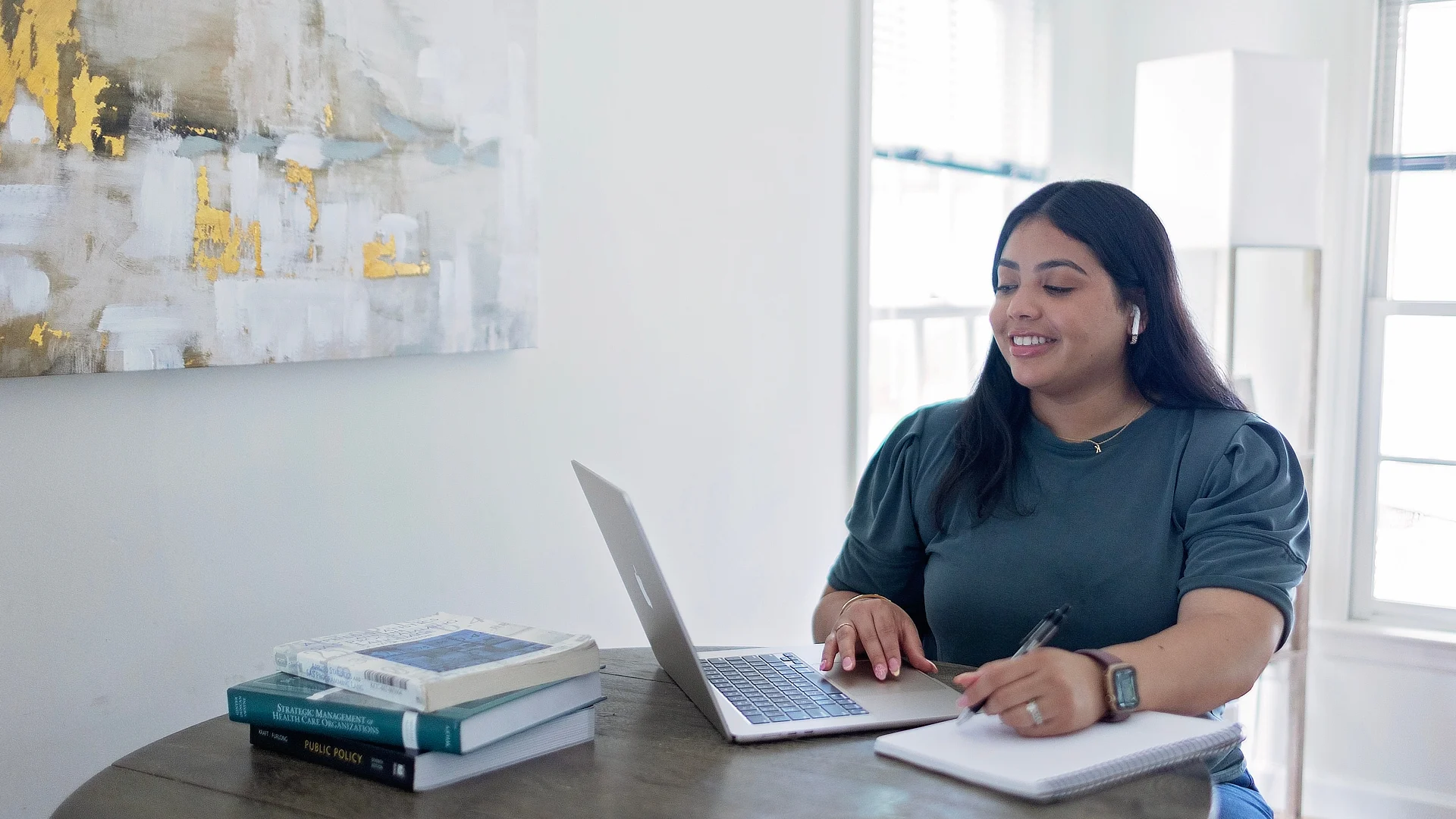 female student working at a table
