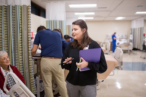 social worker speaking with patient CTA AB10198604