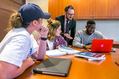 teacher and 3 students