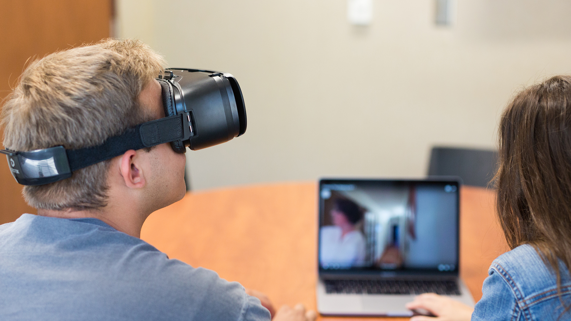 Social Work student using a VR headset