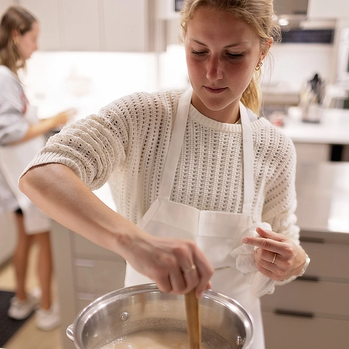 Student Stirring Pot