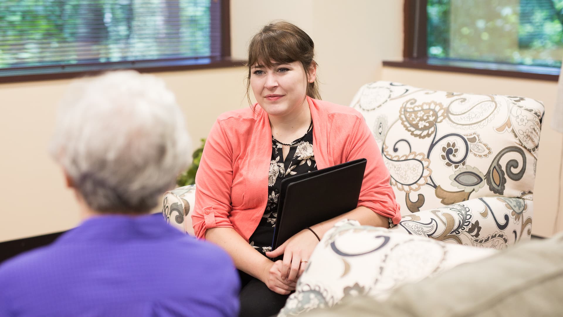 female social worker with older woman