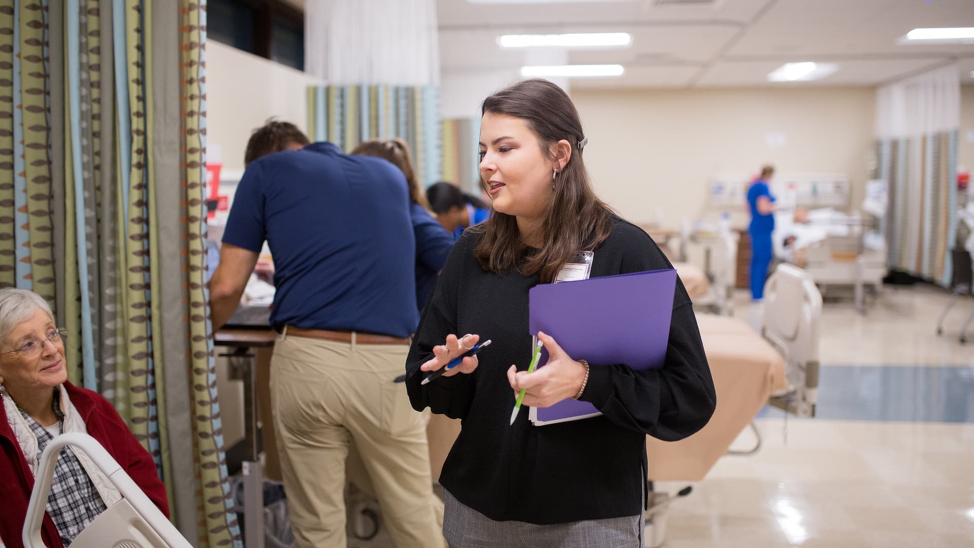 social worker speaking with patient