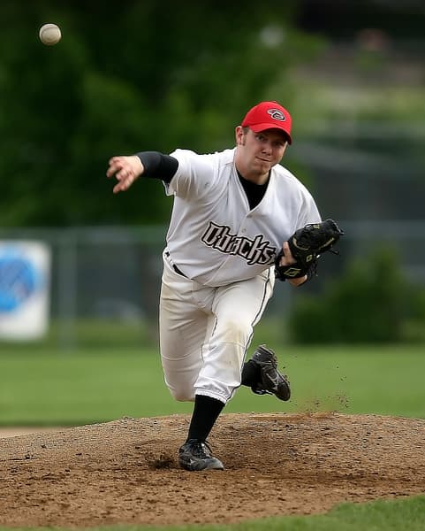 Baseball player pitching